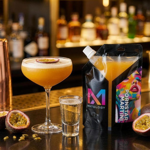 Pornstar Martini cocktail beside the MXTOLOGY pouch