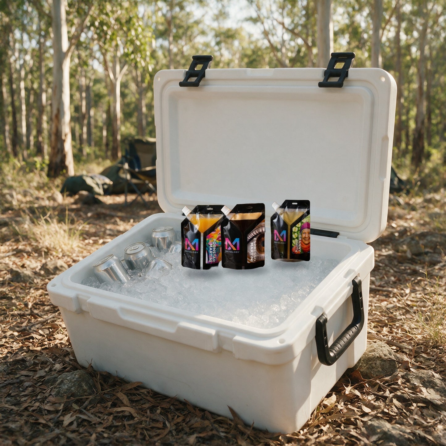 The Muster Pack — MXTOLOGY cocktail pouches on ice in an esky at a gum forest campsite for the Gympie Music Muster