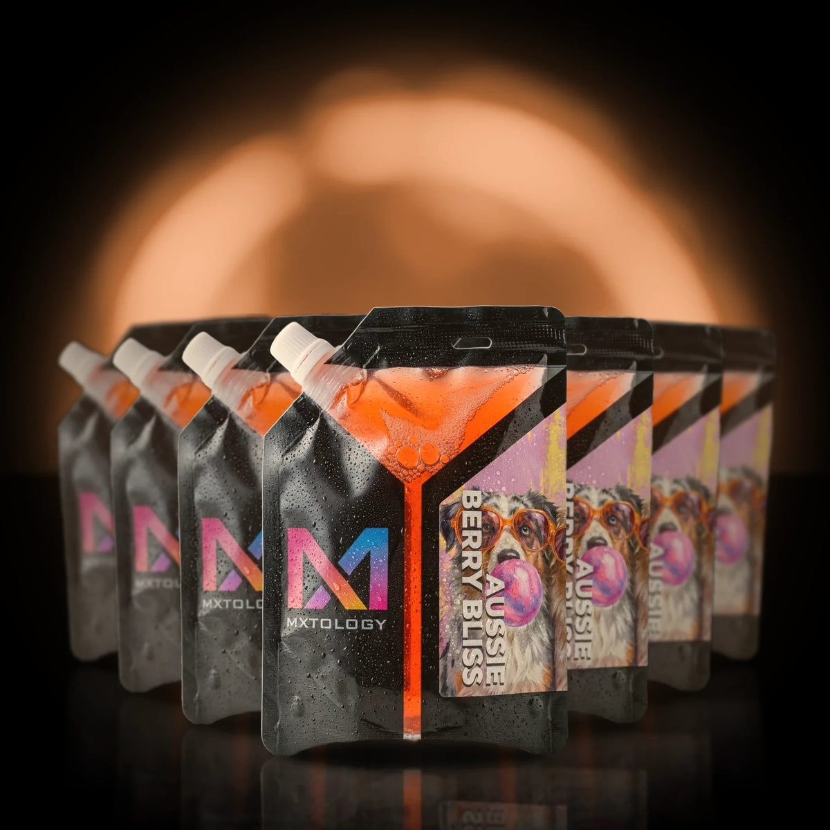 MXTOLOGY Aussie Berry Bliss 10-pack stacked under neon light