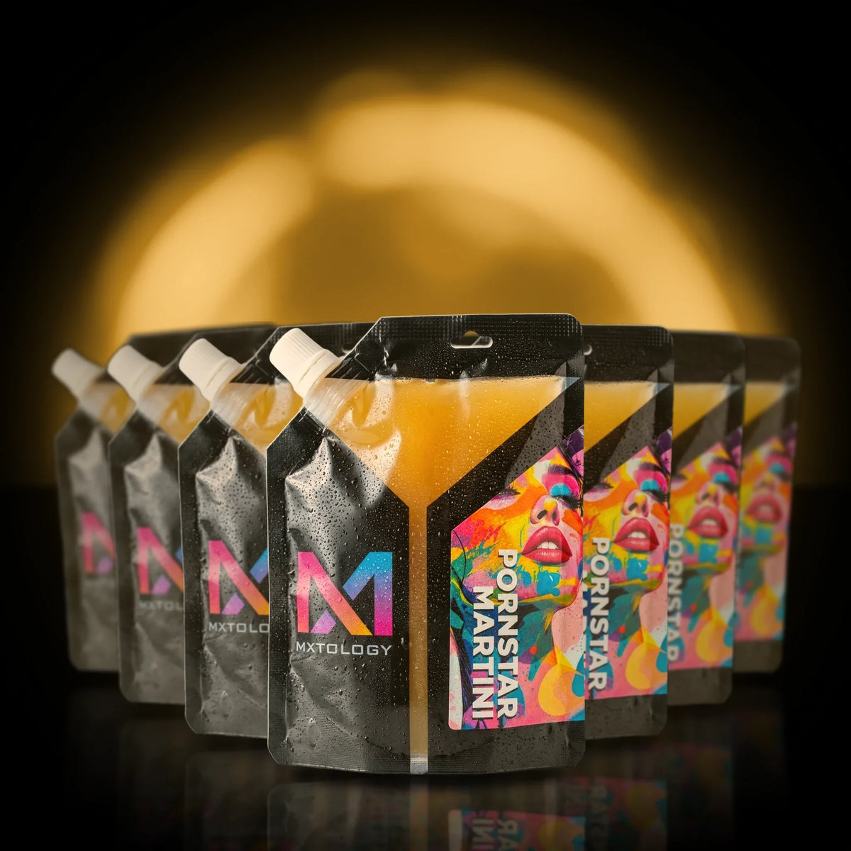 MXTOLOGY Pornstar Martini 10-pack stacked under neon light