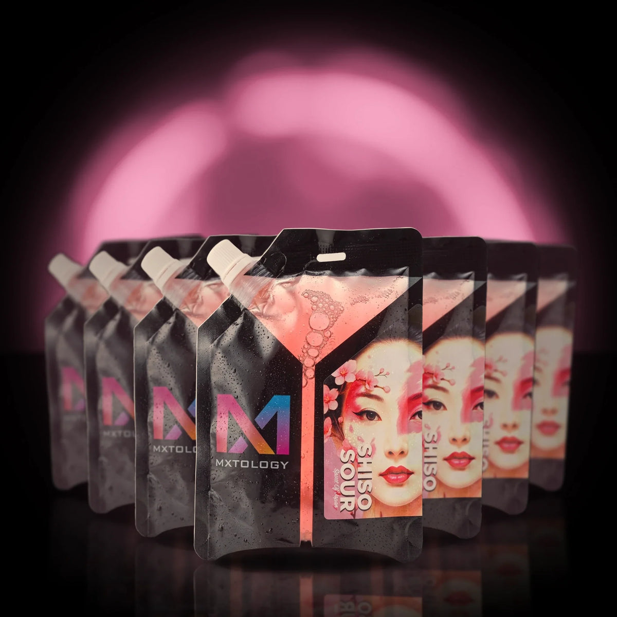 MXTOLOGY Shiso Sour 10-pack stacked under neon light