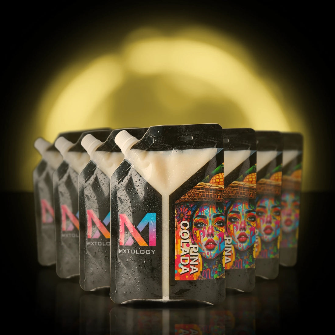MXTOLOGY Pina Colada 10-pack stacked under neon light
