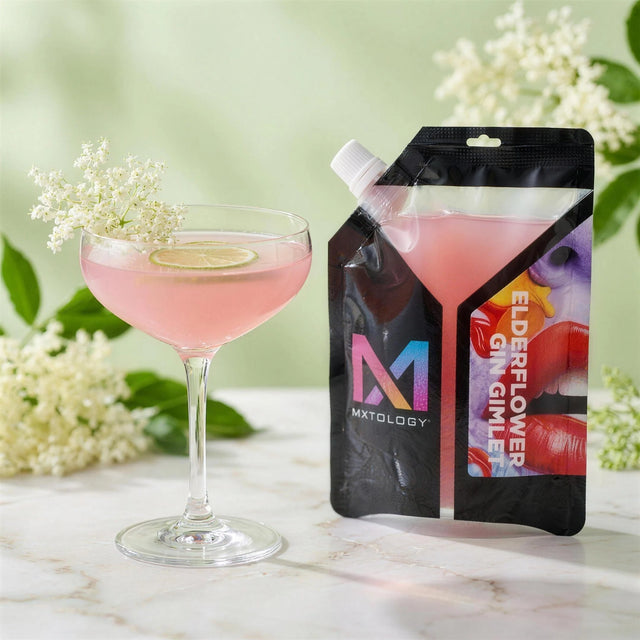 Elderflower Gin Gimlet cocktail beside the MXTOLOGY pouch