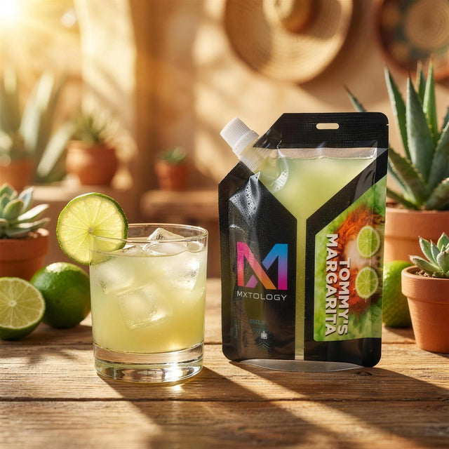 Tommys Margarita cocktail beside the MXTOLOGY pouch